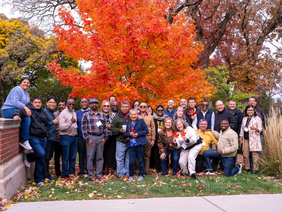 The Friends on the Journey group in Chicago, gathered together outdoors in the fall